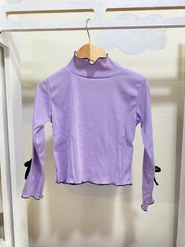 Polera moñito