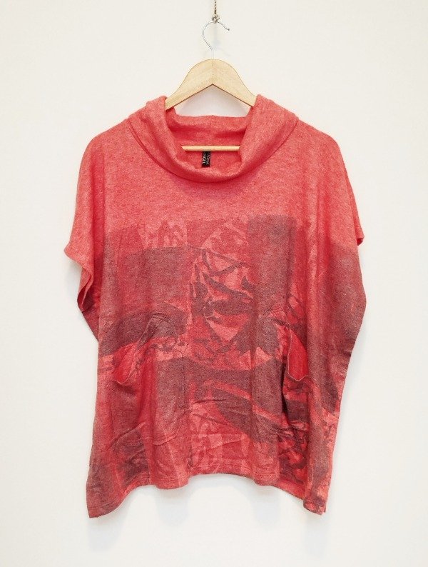 Producto - Poncho Mariel -coral pastel estampa Curvas-