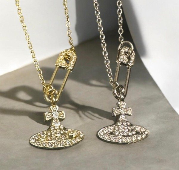 Producto - DIJE CORAZON VIVIENNE WESTWOOD ALFILER GANCHO DORADO/PLATEADO