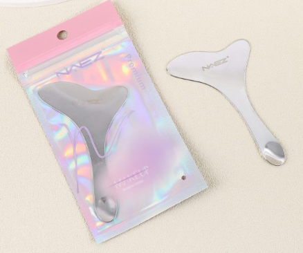 Producto - masajeador de metal.