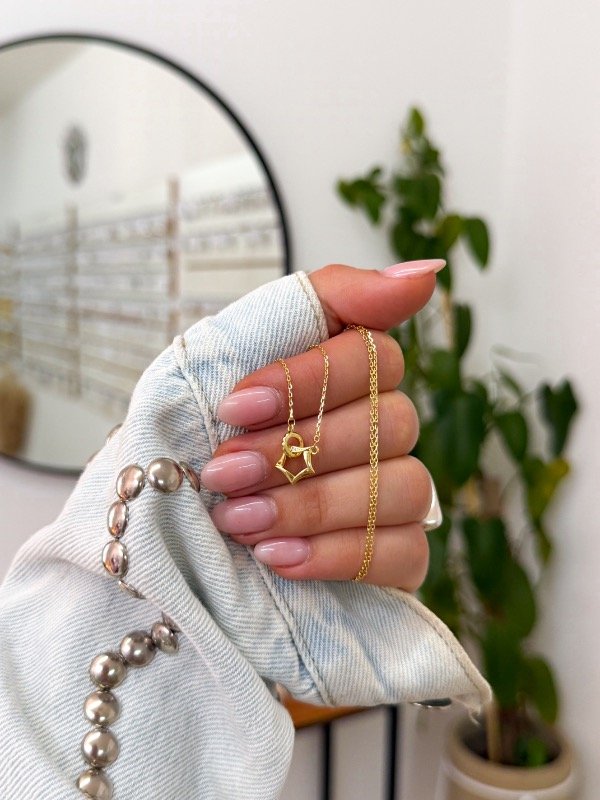 Producto - Cadenita bañada en oro estrellita y círculo