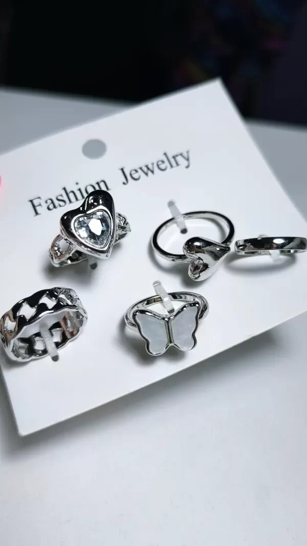 Producto - Anillos x5 plateados