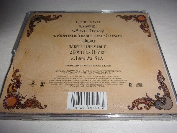Producto - CD NEVER SHOUT NEVER TIME TRAVEL DIFUSION ARG 36E - 1