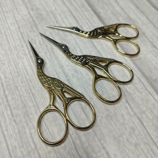 Producto - Tijera cigüeña plateada