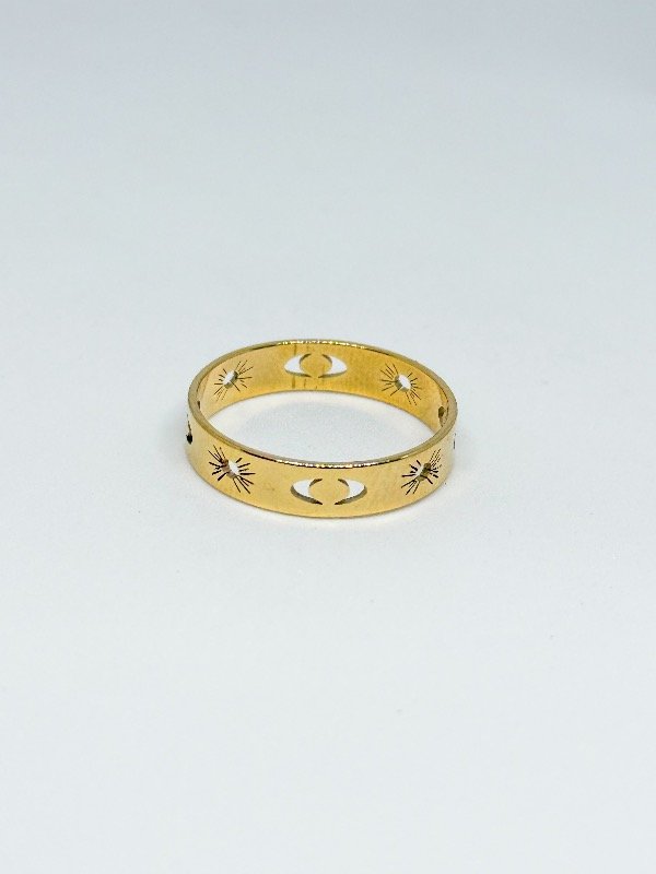 Producto - Anillo acero dorado ojos calados y sol