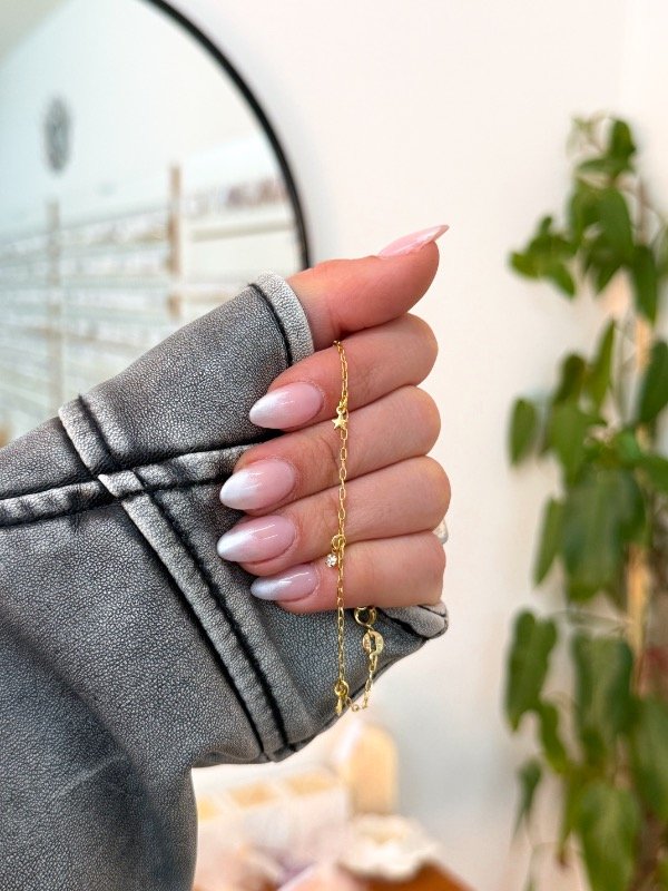 Producto - Pulsera bañada en oro cúbics y estrellitas