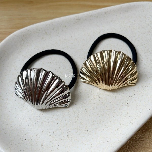Producto - Colita Metal Ostras
