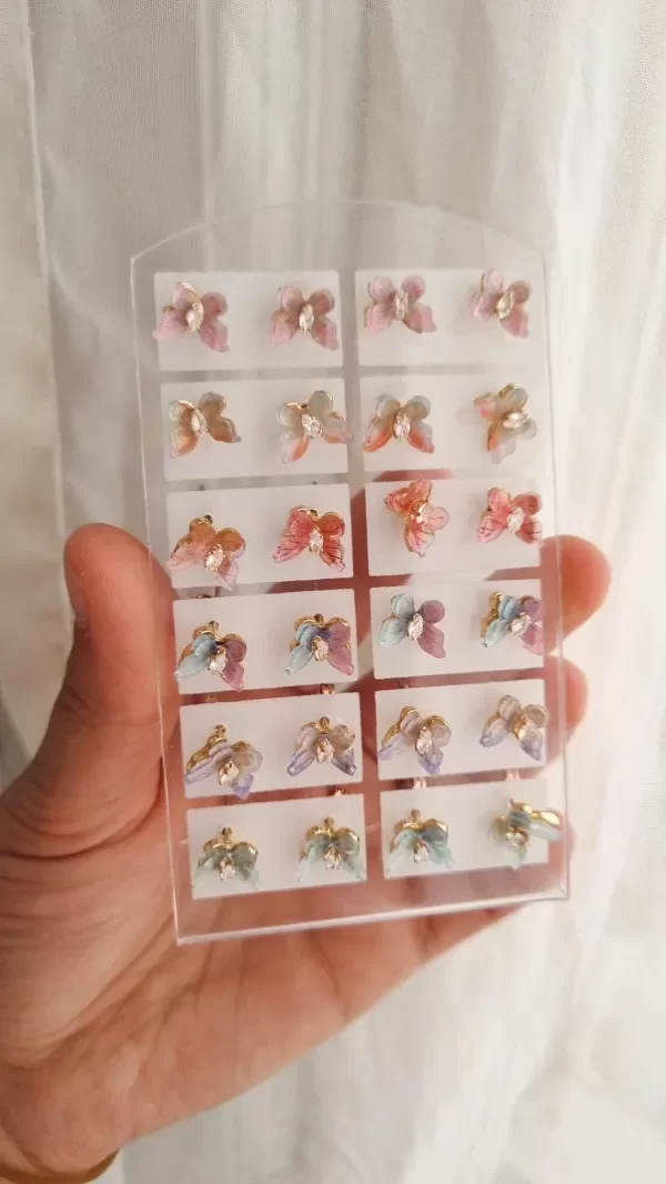 Producto - Mariposas degrade acero dorado por par