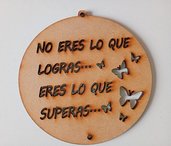 Producto - Atrapasueño circulo con frase "No eres lo que logras eres lo que superas"