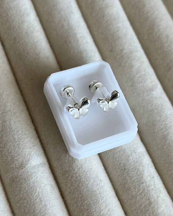 Producto - Aros abridores mariposas de acero blanco
