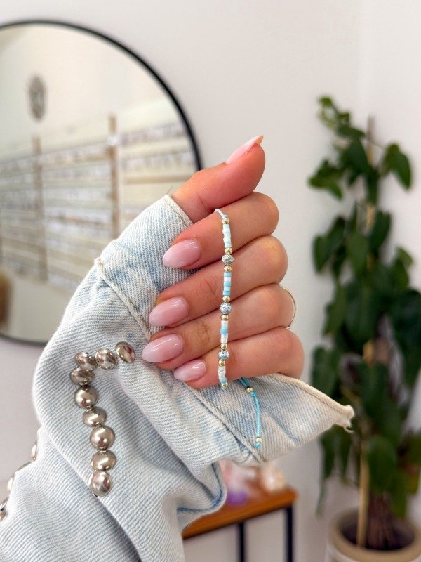 Producto - Pulsera pelotitas celestes