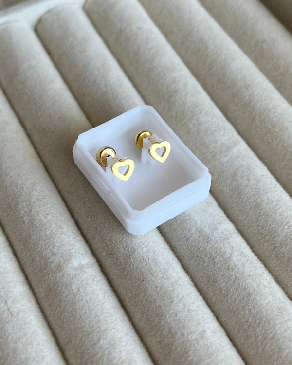 Producto - Abridores de corazón calado de acero dorado