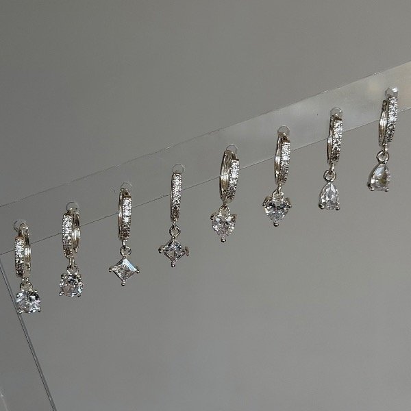 Producto - Aros con dije de acero blanco - 0