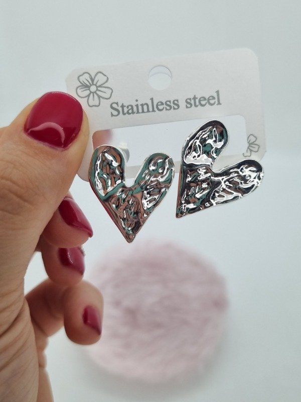 Producto - Aros acero blanco pasante corazon plano text gde