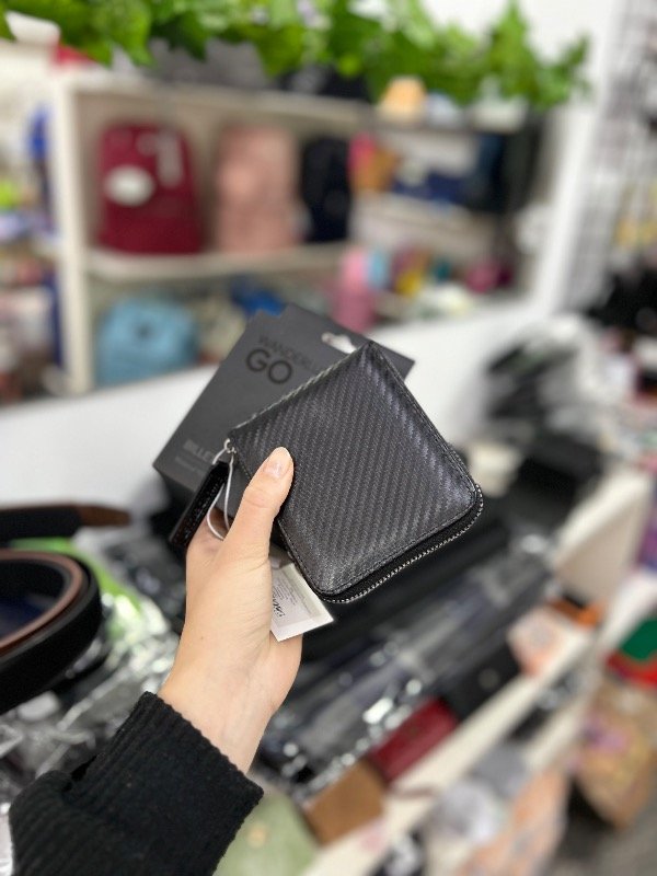 Producto - Billetera wonderlust negra con cierre