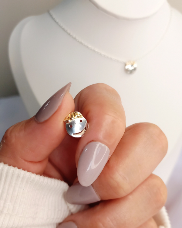 Producto - Carita Feliz Niño Plata y Oro dublé .