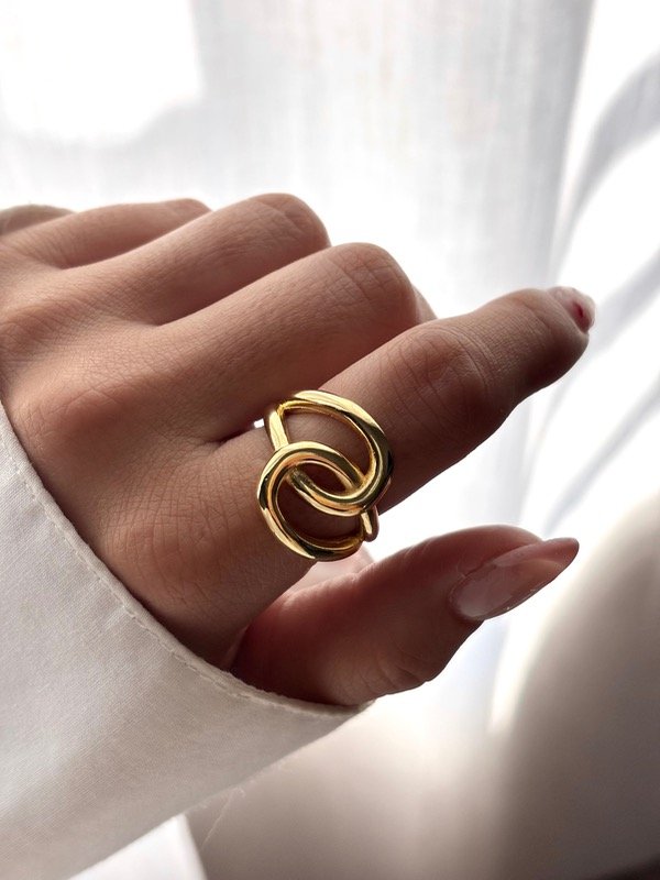 Producto - Anillo dorado doble nudo