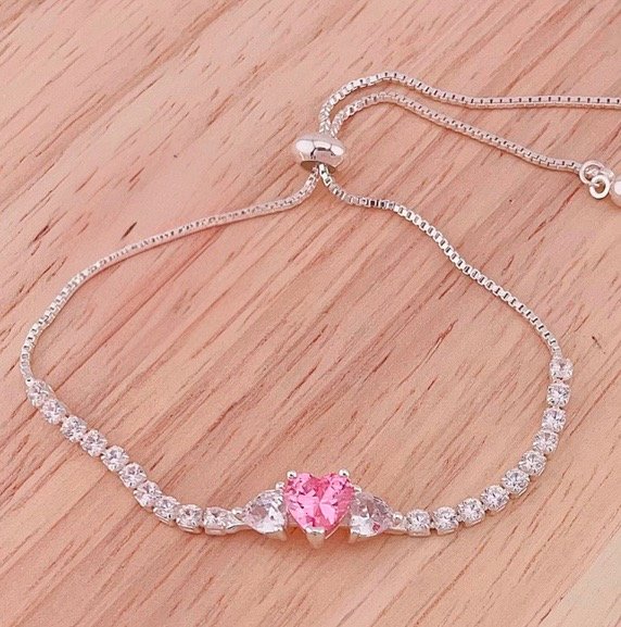 Producto - Puls. Regulable con strass y corazón rosa