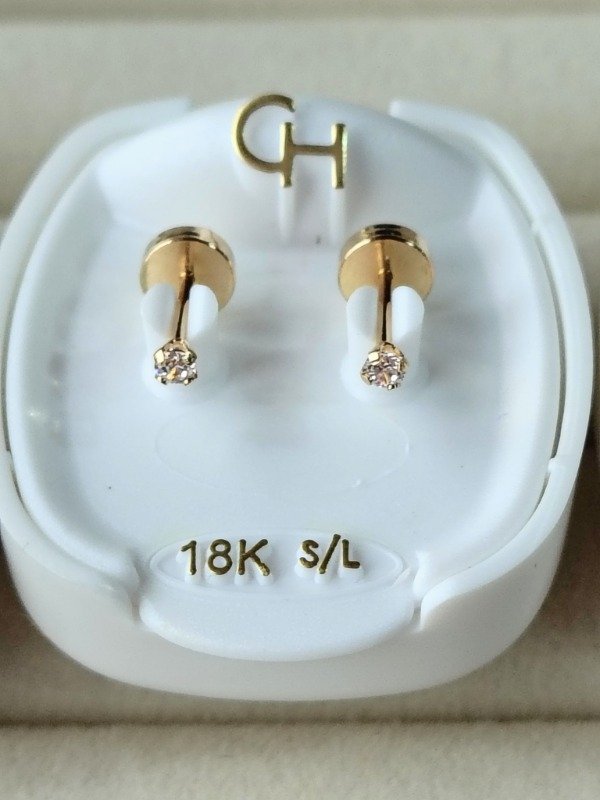 Producto - Abridor CH. Modelo 795. De  Oro 18kts. Grifas Piedras 2mm