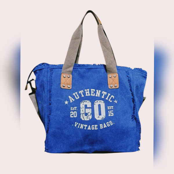 Producto - Bolso Rústico Go. Lona lavable. Bolsillos internos. Super calidad