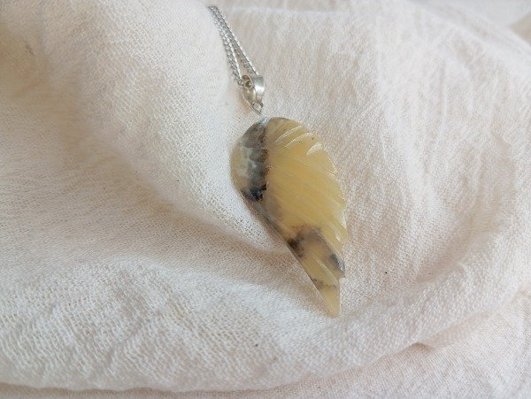 Producto - Collar alita onix amarillo