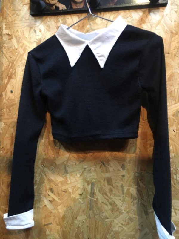 Producto - Top Merlina manga larga
