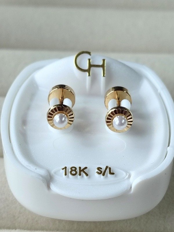 Producto - Abridor CH. Modelo 719. Oro 18 kt. Facetado Con Perla. Linea ECO
