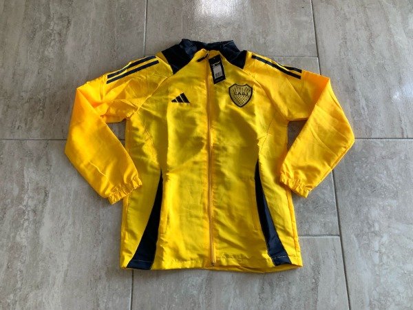 Producto - Campera rompeviento boca amarilla