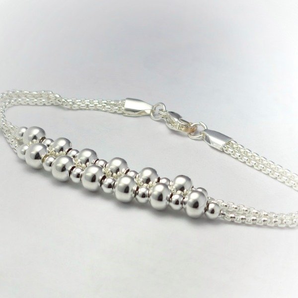 Producto - PULSERA PLATEADA ROLON CON BOLAS