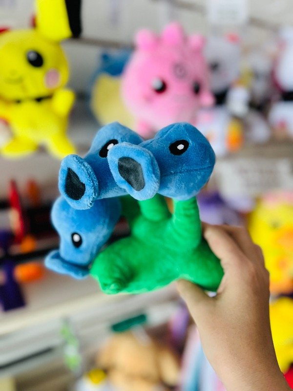 Producto - Peluche planta celeste