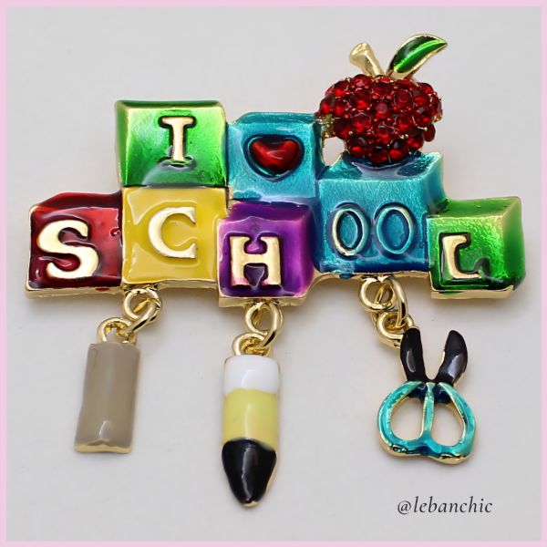Producto - Prendedor School