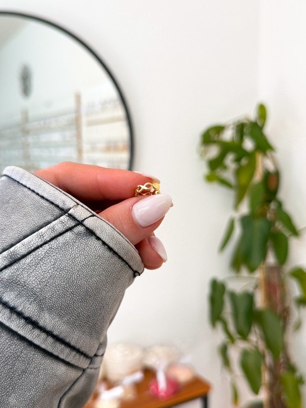 Producto - Ear cuff acero dorado infinitos