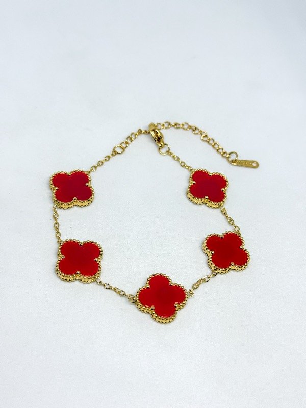 Producto - Pulsera acero dorado van cleef piedras rojas