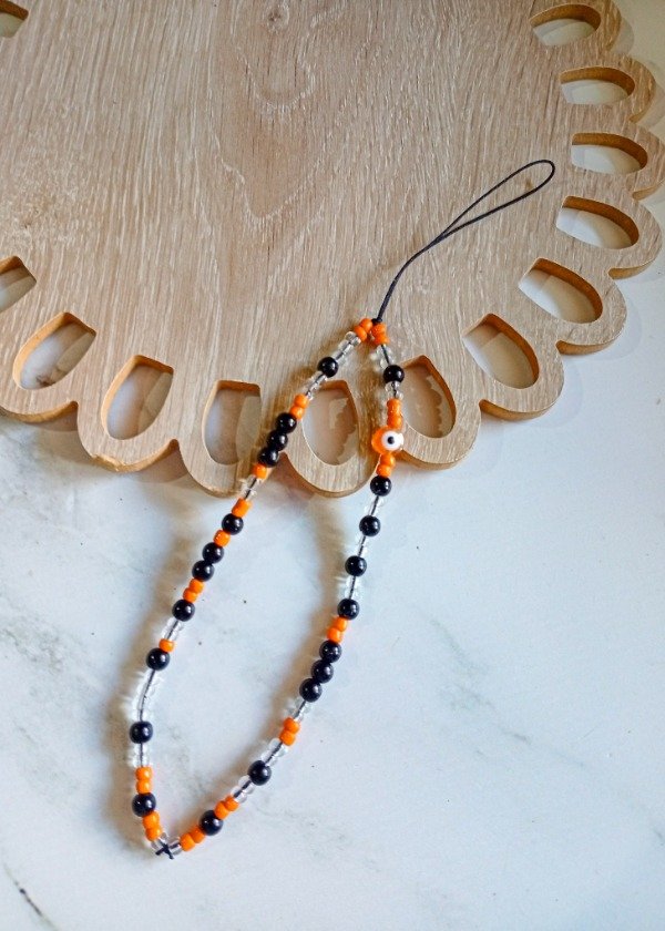 Producto - Strap naranja ojito