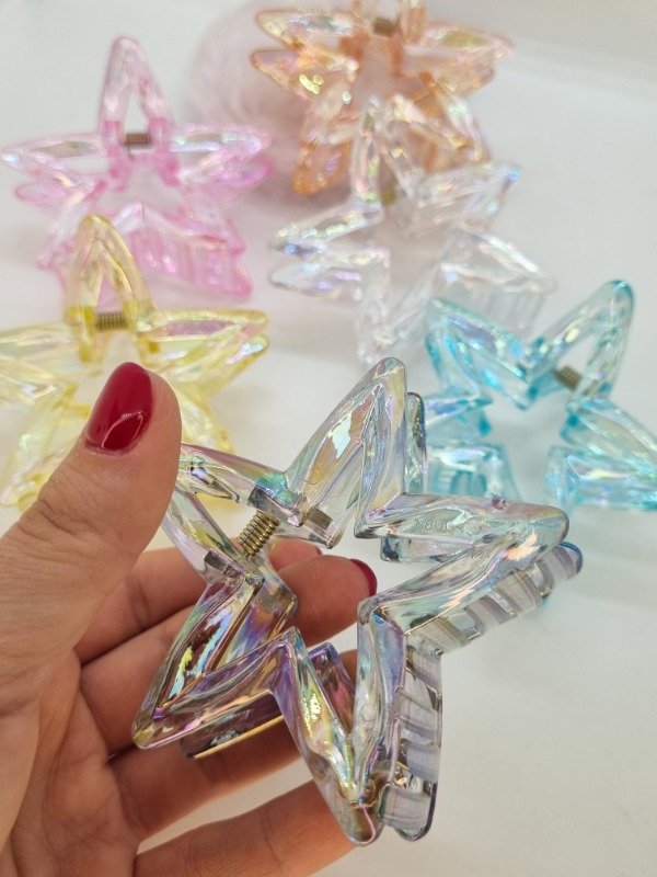 Producto - Broche plastico estrella calada color translúcido