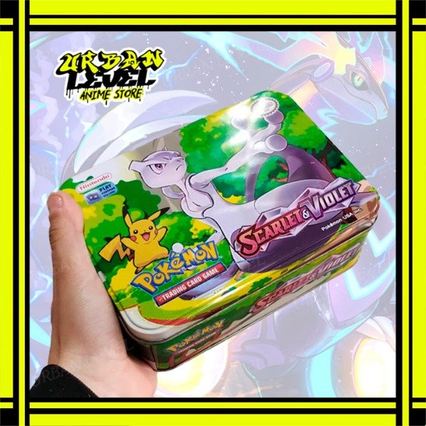 Producto - Cartas Pokemon Lata Pokemon Con 2 mazos y 3 sobres sorpresa