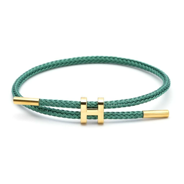 Producto - Pulsera cordón Hermes verde con dije h acero dorado