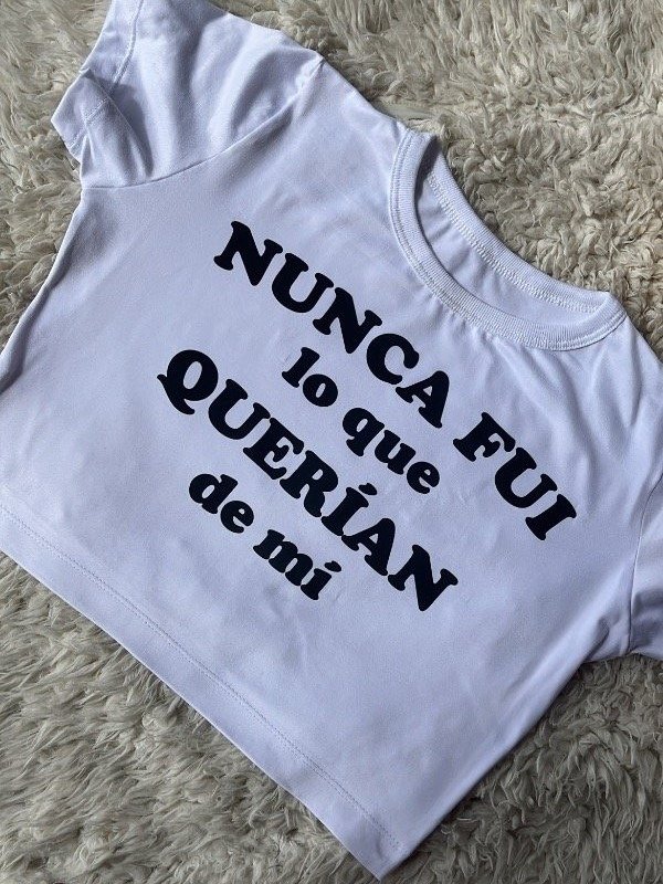 Producto - BABY TEE LALI "NUNCA FUI"