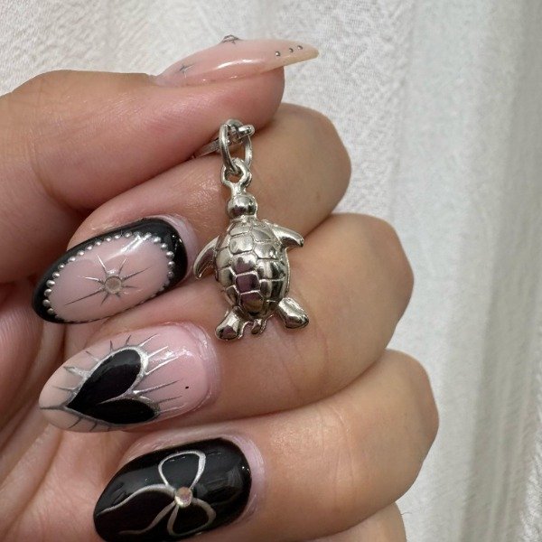 Producto - Trotuga Charms Plateado