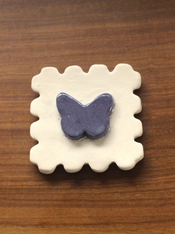 Producto - Imán de cerámica Estampilla Mariposa