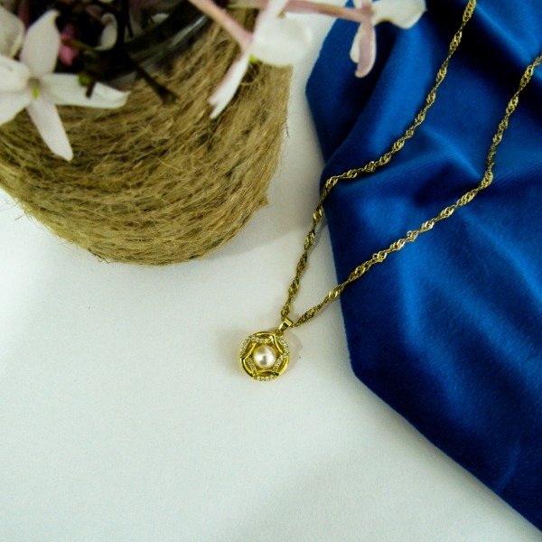 Producto - Dije Giratorio Perla y Strass
