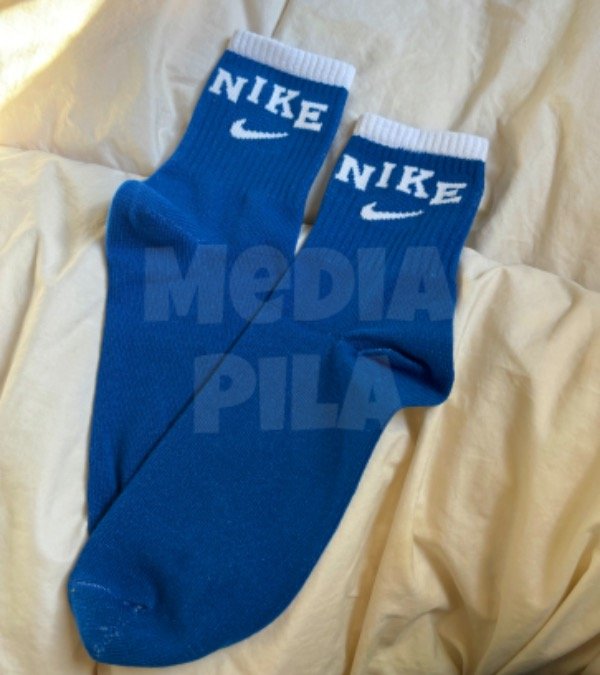 Producto - Media caña - Nike azul puño blanco