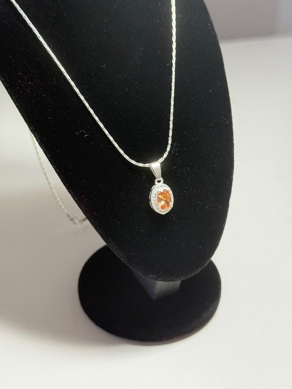 Producto - Dije con piedra dorado - 0