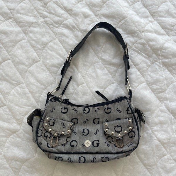 Producto - G iconic purse.