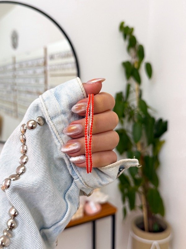Producto - Pulseras elastizadas x2 strass naranjas