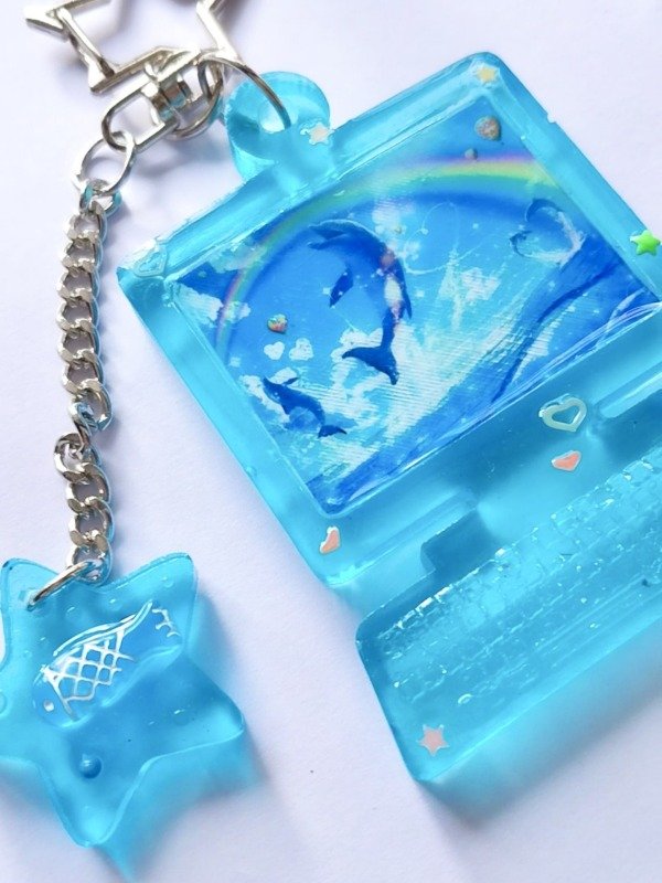 Producto - Computadora delfines