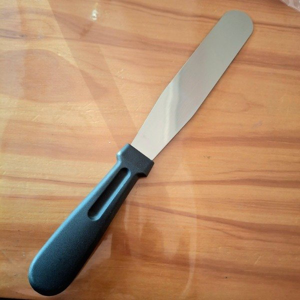 Producto - Espátula recta acero inox. mango de negro corta