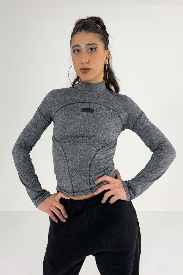 Producto - PREVENTA Polera Enigma Gris
