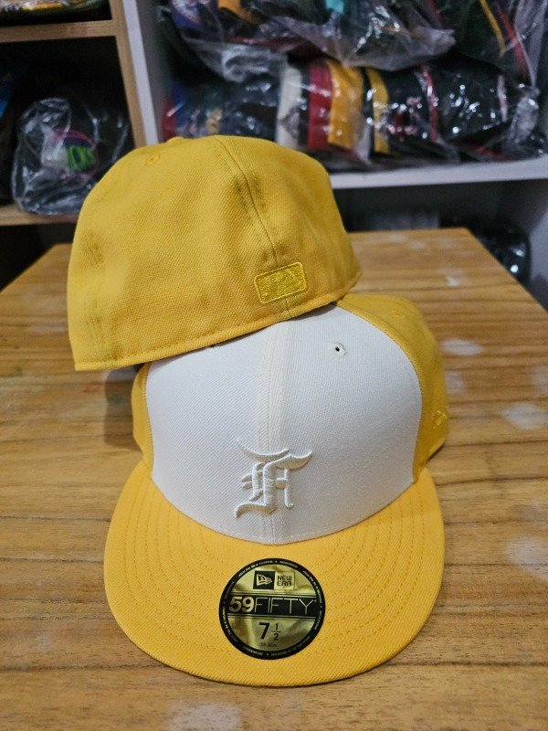 New era fear of god essentials yellow — imagen 5