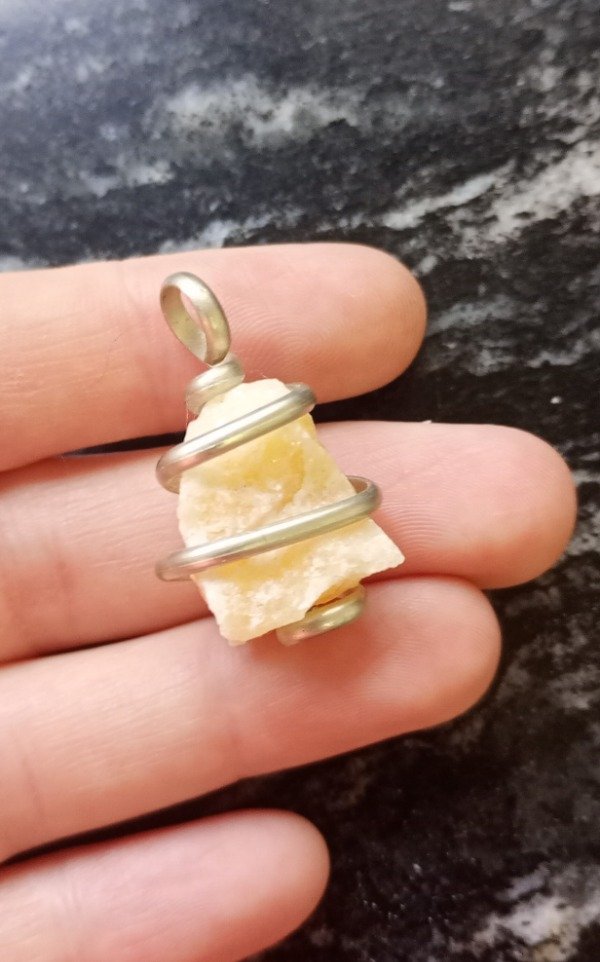 Producto - Dije de calcita en bruto